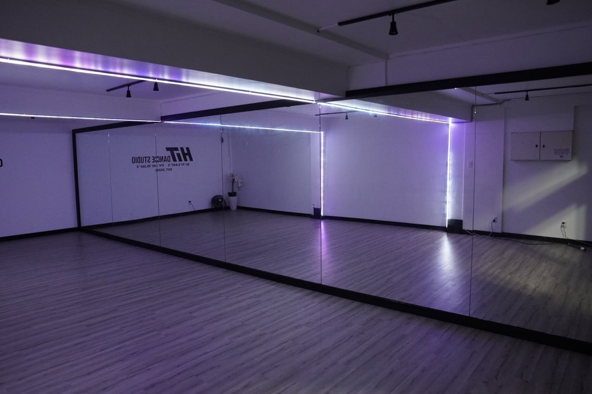 Studio 2 with the room lights dimmed and purple LED strips illuminated